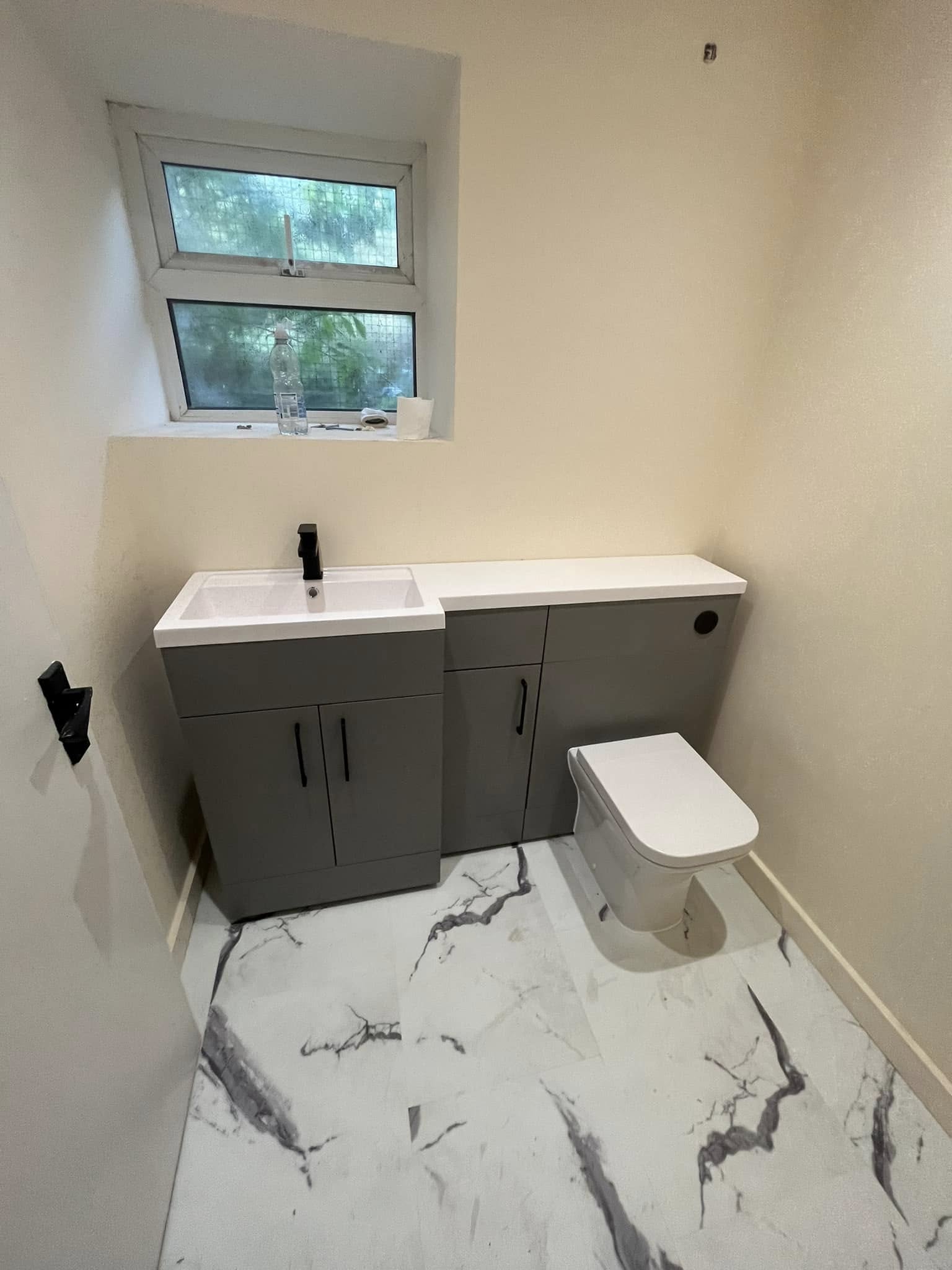 Full salon fit-out with marble flooring and hairdressing stations
